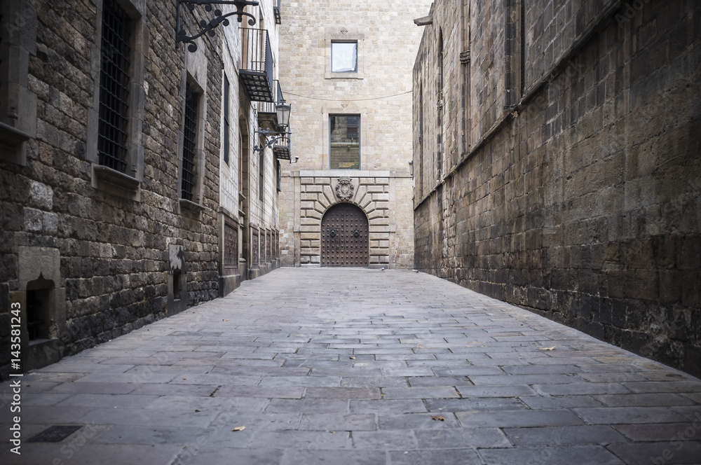Ancient street in gothic quarter near to cathedral of Barcelona,Spain.