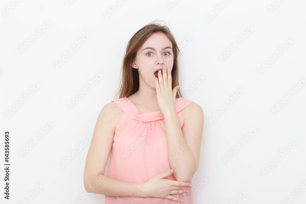 Young casual woman In pink blouse isolated over white background studio portrait Young casual woman In pink blouse isolated over white background studio portrait
