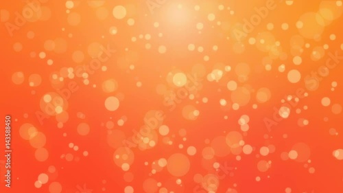 Beautiful red orange glowing bokeh background with floating light particles.