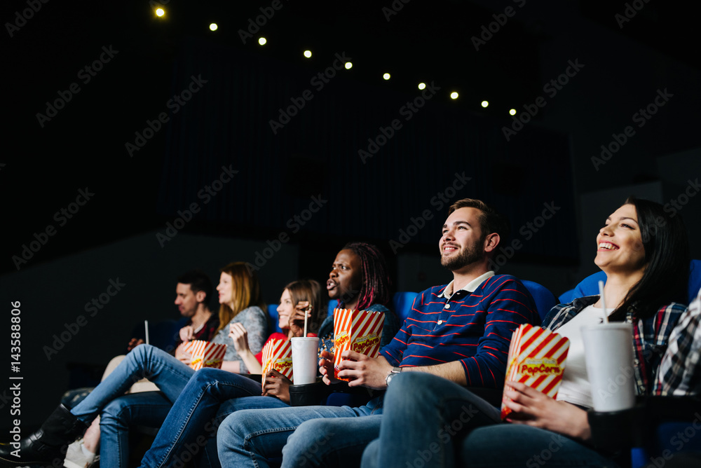 Laughing at a movie scene Laughing at a movie scene