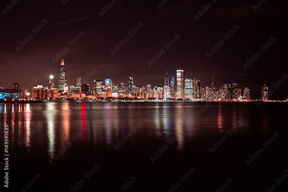 Chicago skyline at night. View on Michigan lake and downtown Chicago. Illinois. USA
