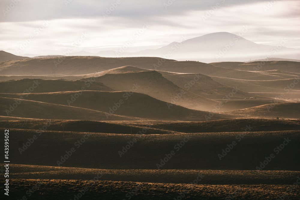 View of landscape against cloudy sky View of landscape against cloudy sky