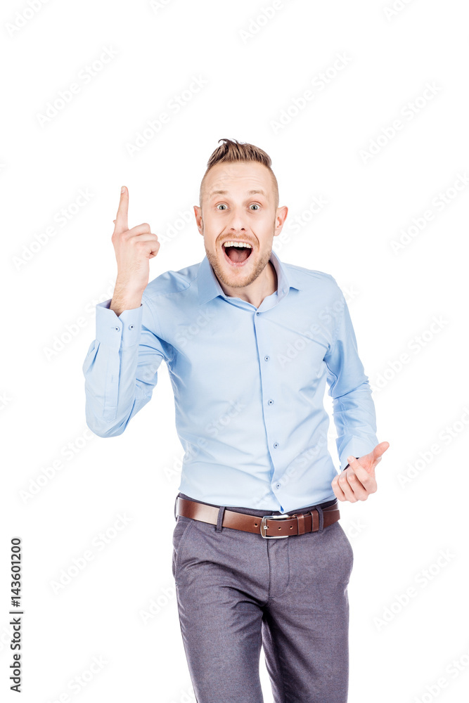 portrait young man pointing up, showing something, having an idea portrait young man pointing up, showing something, having an idea