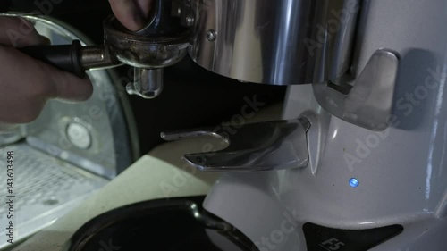 Bartender work on a espresso machine