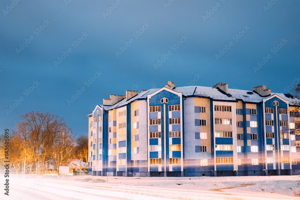 Multi-storey House In Residential Area At Winter Evening Or Nigh
