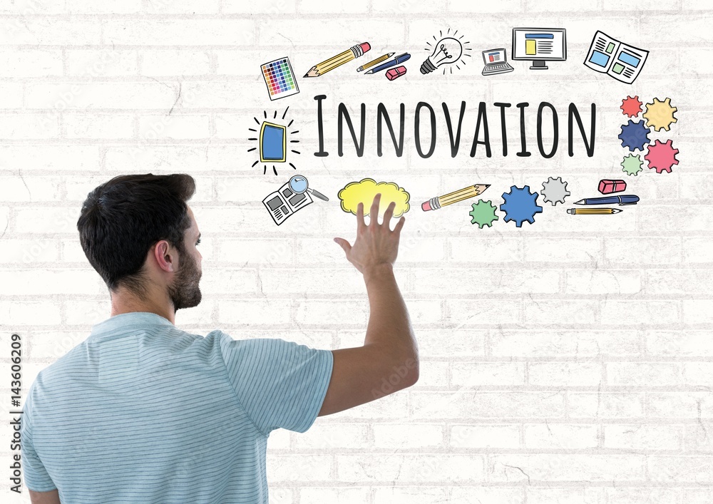 Man touching Innovation text with drawings graphics Man touching Innovation text with drawings graphics