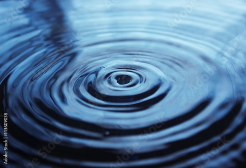 Water drop impact on water surface