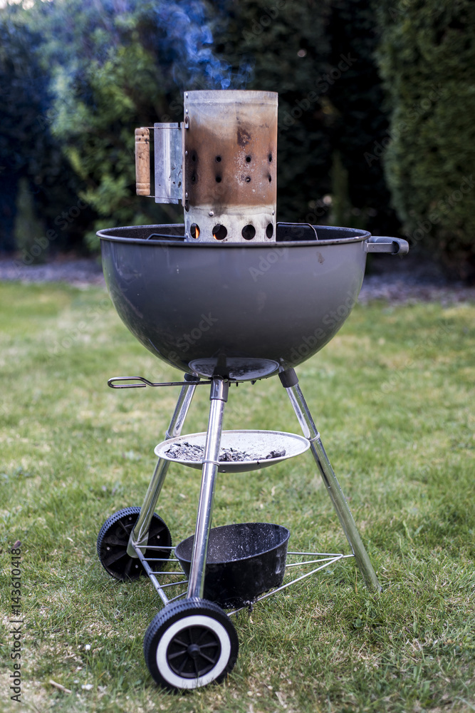 kettle barbecue charcoal grill roasting BBQ standing on ready action Stock Photo | Adobe Stock