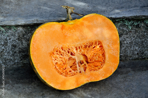 Cross section of a pumpkin isolated on nature background