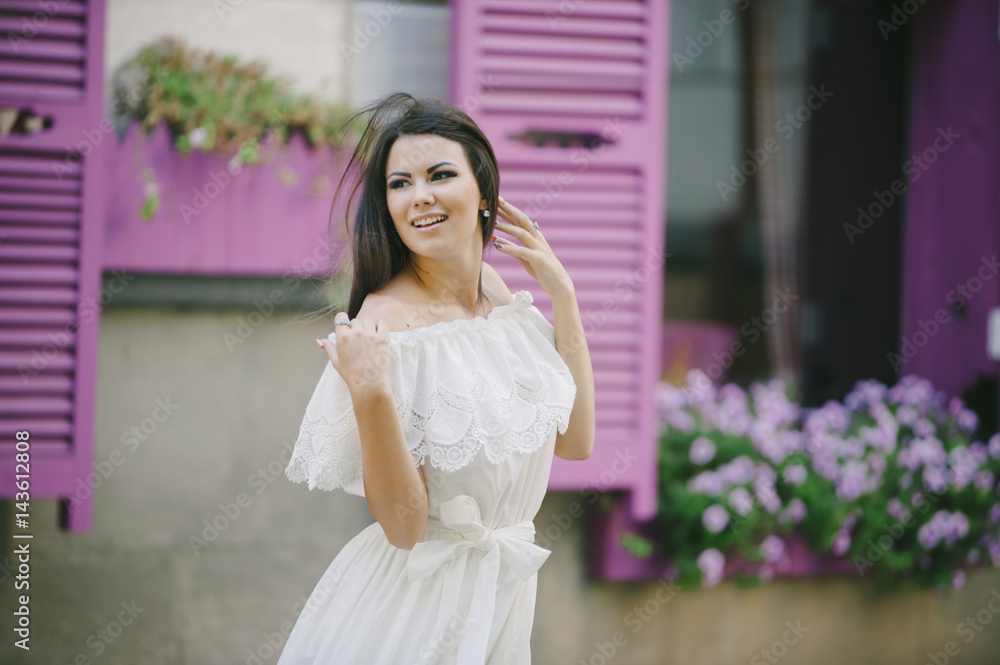 brunette in a dress