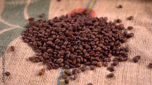 Coffee is poured on the burlap. High quality 4k