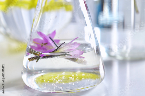 Glassware with perfume essence, closeup