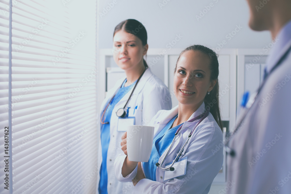 Young team or group of doctors standing in hospital Young team or group of doctors standing in hospital