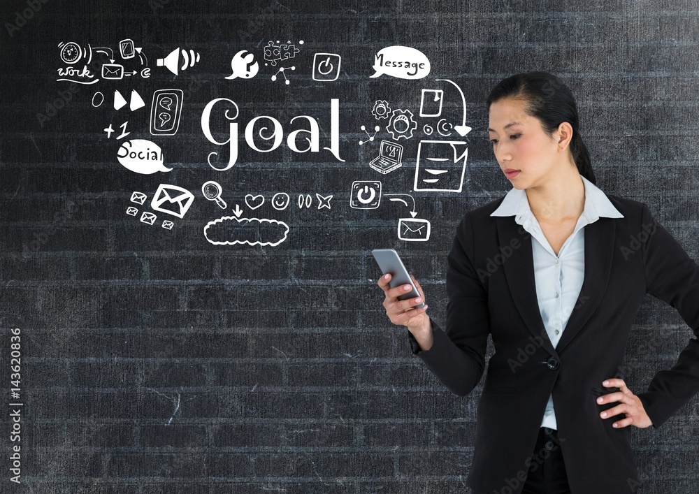 Businesswoman on phone with Goal text with drawings graphics Businesswoman on phone with Goal text with drawings graphics