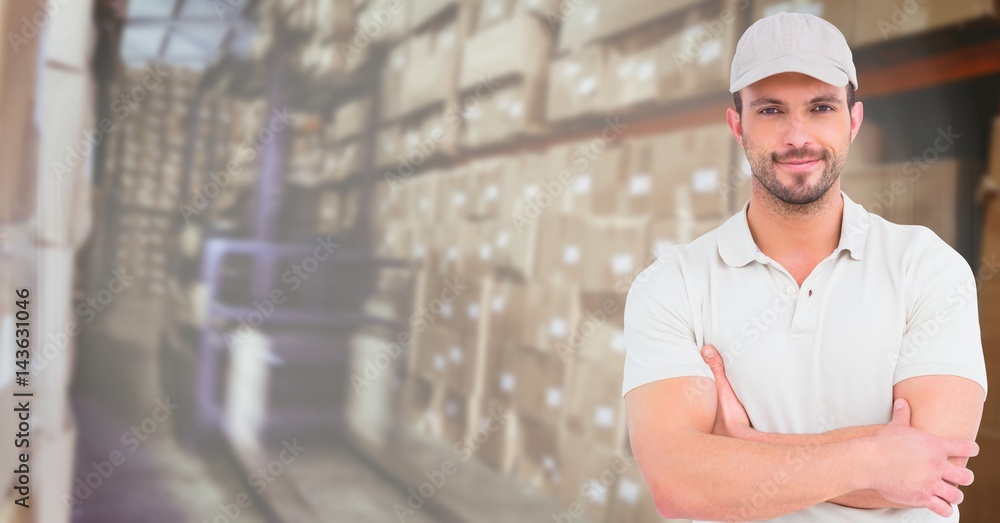 Delivery men with his hands folded in the store house Delivery men with his hands folded in the store house