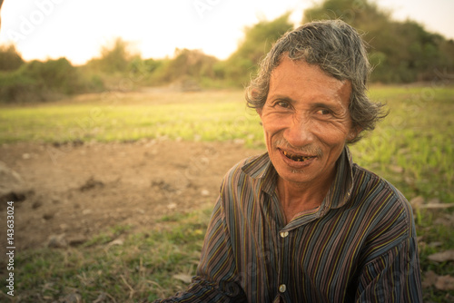 The Myanmar people are smiling.