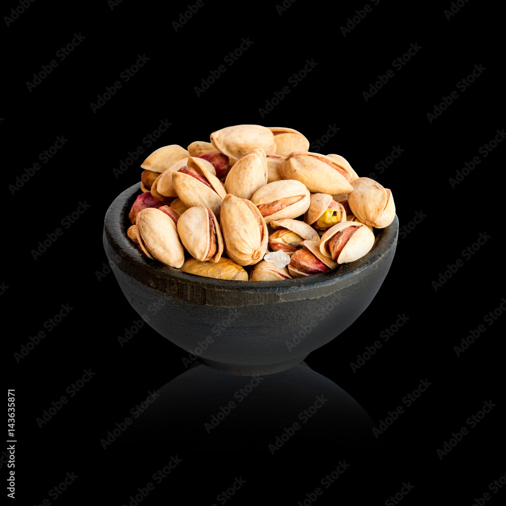 Pistachios in a Round Bowl Isolated on White Background Pistachios in a Round Bowl Isolated on White Background