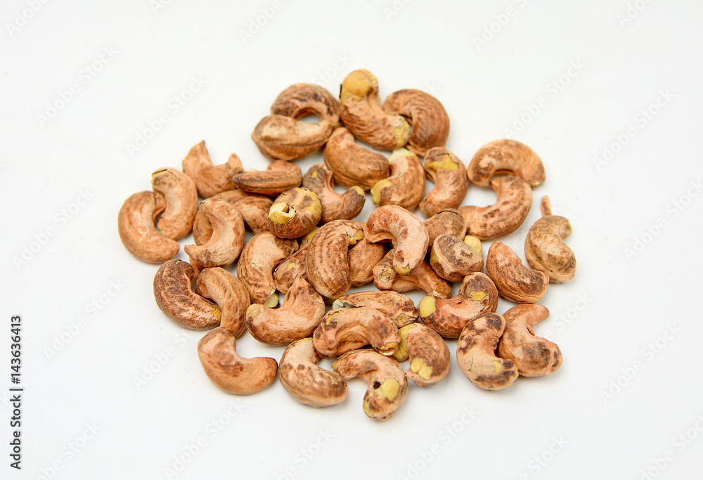 cashew nut with peel on white background cashew nut with peel on white background