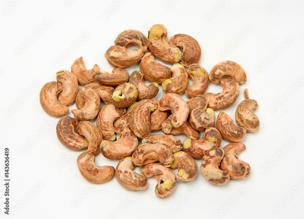 Fototapeta premium cashew nut with peel on white background
