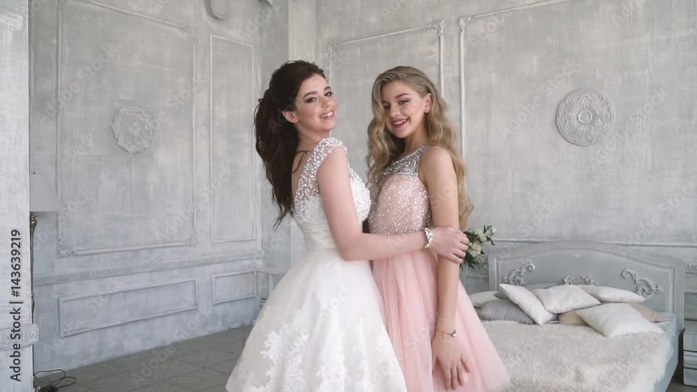 Portrait of the best girlfriends. Charming girls are having fun and going on holiday Portrait of the best girlfriends. Charming girls are having fun and going on holiday