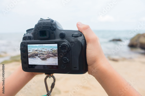 Taking and shooting on the beach travel scene