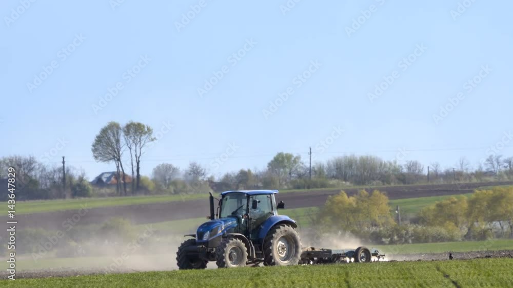 Tractor ploughing the field Tractor ploughing the field
