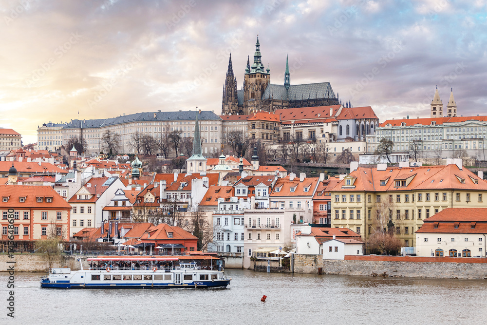 Panoramic view of Vltava river in Prague with tourist ship