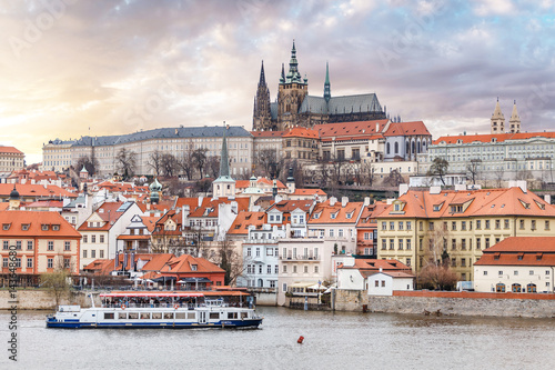 Panoramic view of Vltava river in Prague with tourist ship