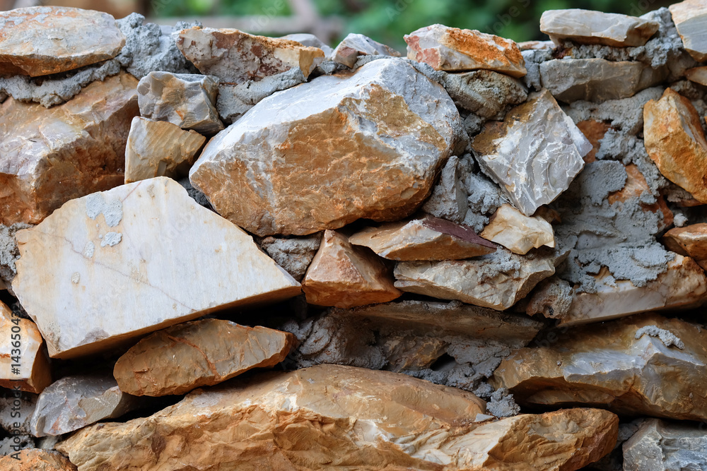 The real stone walls are stacked together with cement. The real stone walls are stacked together with cement.
