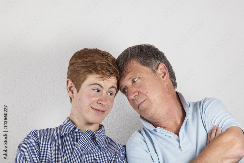 father and son hugging father and son hugging