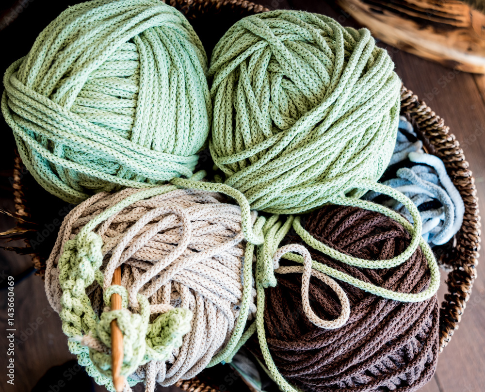 Ball of yarn on the table. Material for knitting.