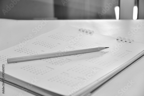 Blurred calendar page in planning concept black and white tone.