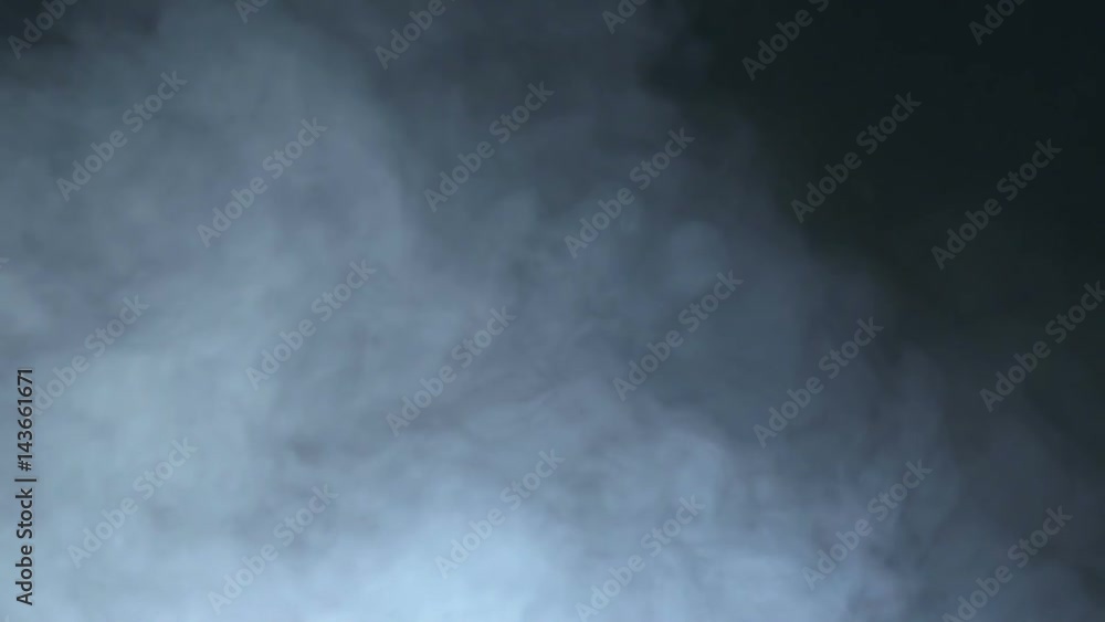 Smoke on a black background in slow motion. Smoke on a black background in slow motion.