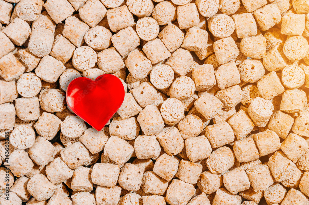 Healthy food, bran background and heart symbol Healthy food, bran background and heart symbol