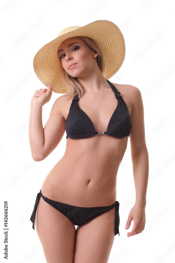 Young girl in black bikini posing Stock Photo | Adobe Stock