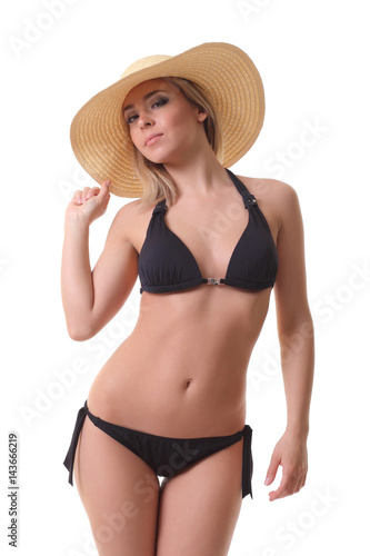 Young girl in black bikini posing