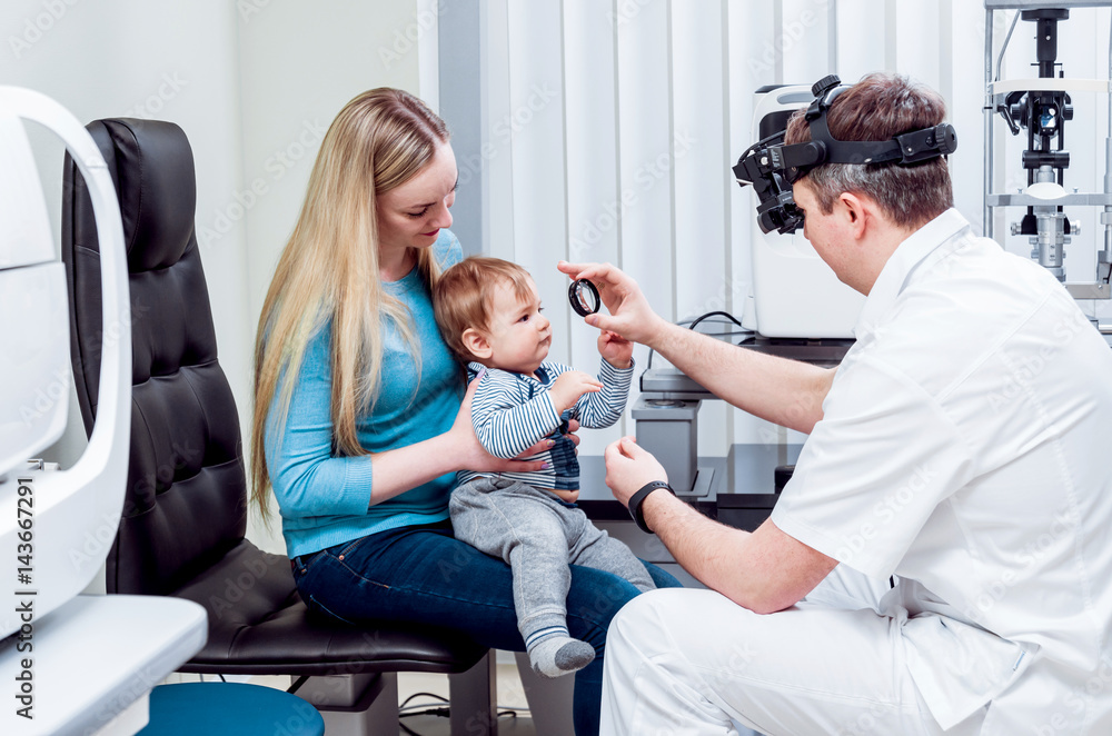 Indirect ophthalmoscope. Retinal examination. Fundoscopy. Child vision