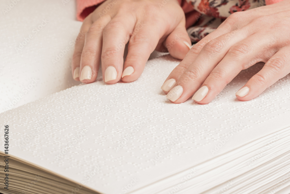 Books Braille. The touch of your fingertips the texture of the paper, reading the sign. Reading the book blind man. Books Braille. The touch of your fingertips the texture of the paper, reading the sign. Reading the book blind man.