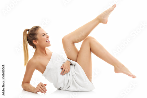 Beautiful woman with towel after bath isolated on white background