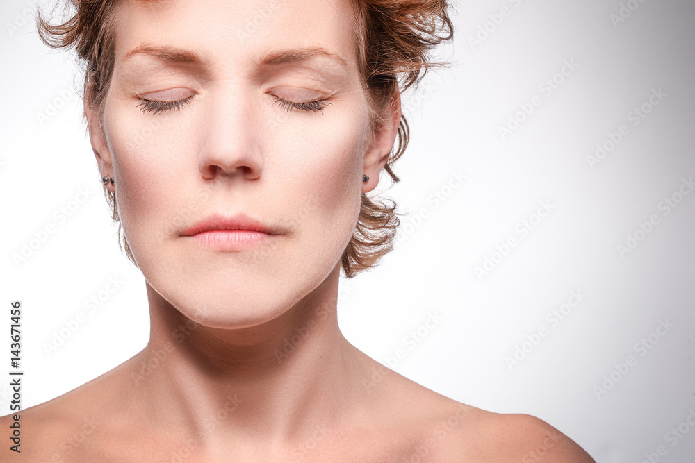 portrait of beautiful, natural, middle aged woman with short brown hair with closed eyes relaxing and thinking - beauty concept portrait of beautiful, natural, middle aged woman with short brown hair with closed eyes relaxing and thinking - beauty concept