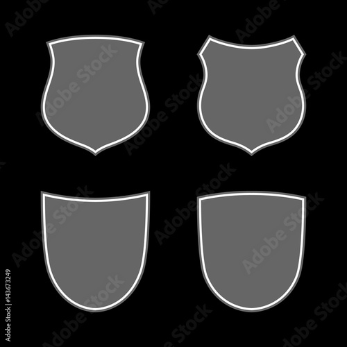 Shield shape icons set. Gray label signs isolated on black background. Symbol of protection, arms, security, safety. Flat retro style design. Element vintage heraldic emblem Vector illustration