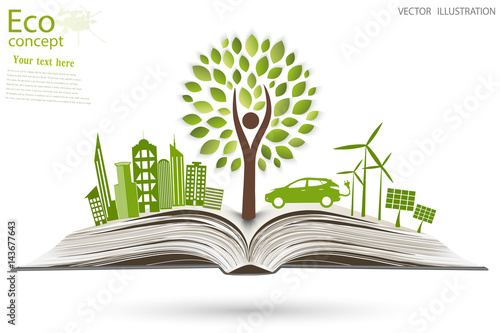 Town, tree,windmill, solar panels on the open book.