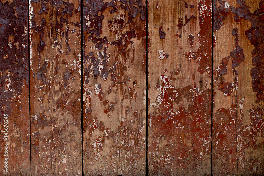 Old wood background with peeling paint.