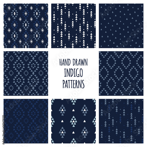 Set of hand drawn indigo blue patterns. Seamless vector aztec backgrounds with triangles, arrows, rhombuses and diamonds.