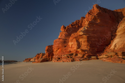 Western Australia – rocky coastline with red colored rocks at Dampier Peninsula