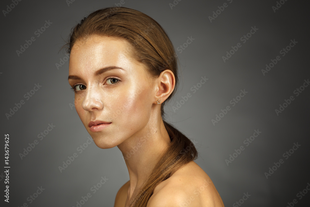 Beautiful girl with shiny skin. Facial and cosmetic treatments Beautiful girl with shiny skin. Facial and cosmetic treatments