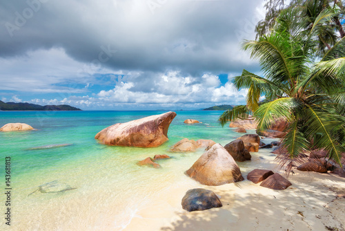Paradise beach on tropical island, Praslin, Seychelles. © lucky-photo
