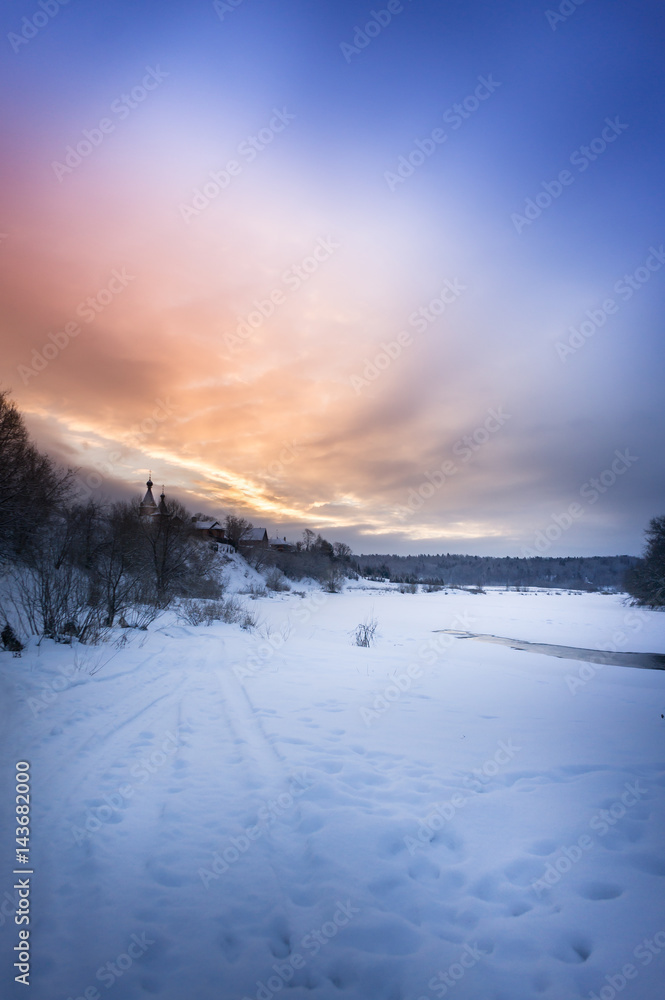 Winter sunrise in forest and river near the russian orthodox church, fantastic winter nature landscape, wallpaper