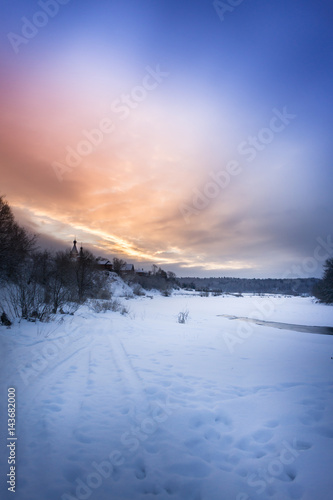 Winter sunrise in forest and river near the russian orthodox church, fantastic winter nature landscape, wallpaper © Mak