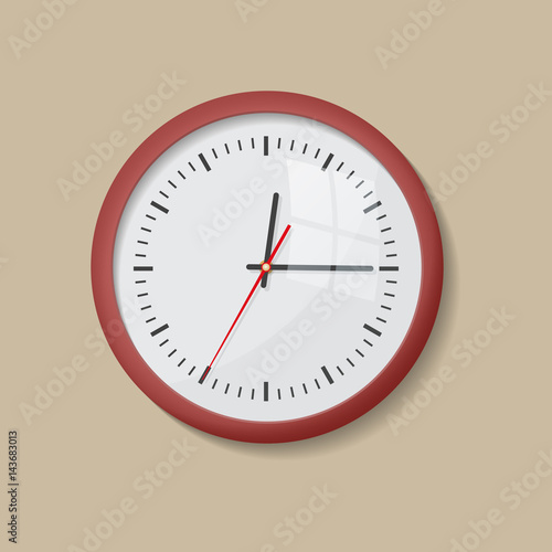 Realistic round red wall clock isolated on a beige backgound. Modern analog clock hanging on the wall.